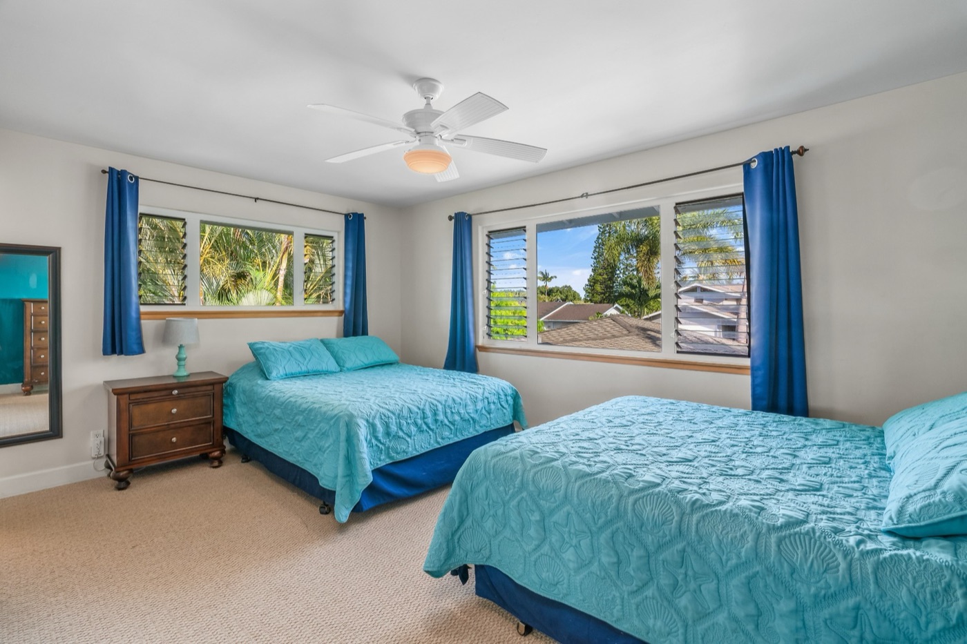 Upstairs guest room with two queen beds